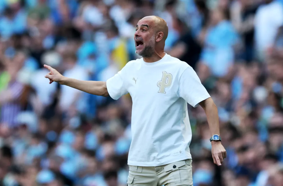 Pep Guardiola, Manager of Manchester City, gestures and reacts during the Premier League match between Manchester City and Aston Villa