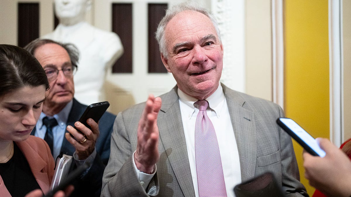 Sen. Tim Kaine speaking to reporters in the U.S. Capitol
