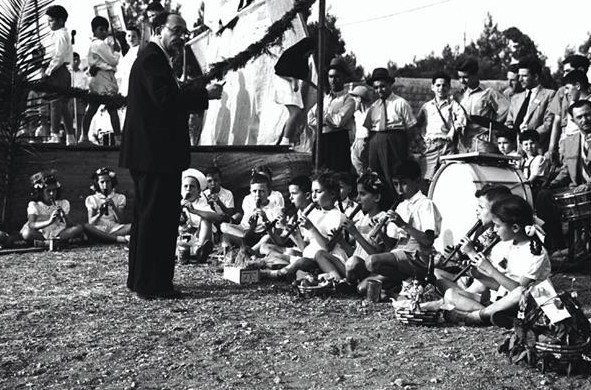 Celebrating Shavuot in the courtyard of the Hebrew Gymnasium in Jerusalem, May 1947. Credit: Lazar Diner, KKL-JNF Photo Archive.