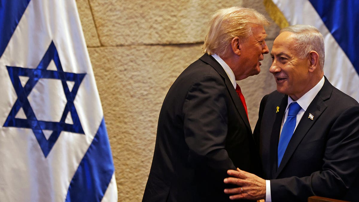 U.S. President Donald Trump speaking with Israel's Prime Minister Benjamin Netanyahu in the Knesset in Jerusalem