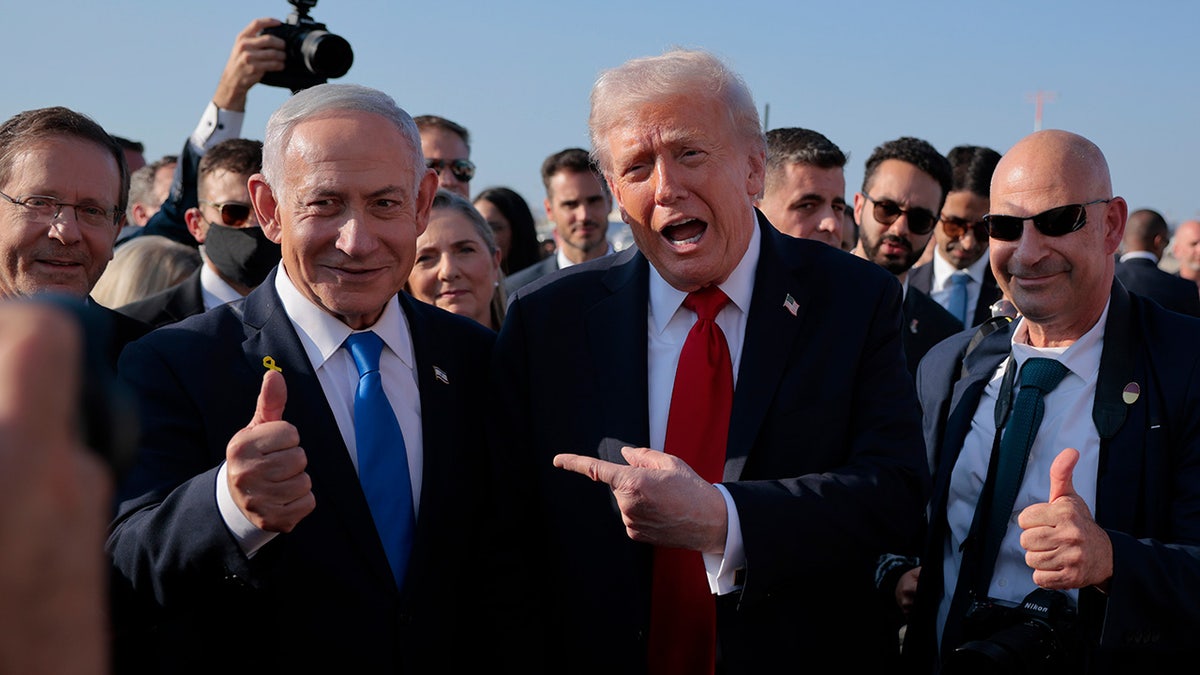 U.S. President Donald Trump speaking to Israeli Prime Minister Benjamin Netanyahu at Ben Gurion International Airport