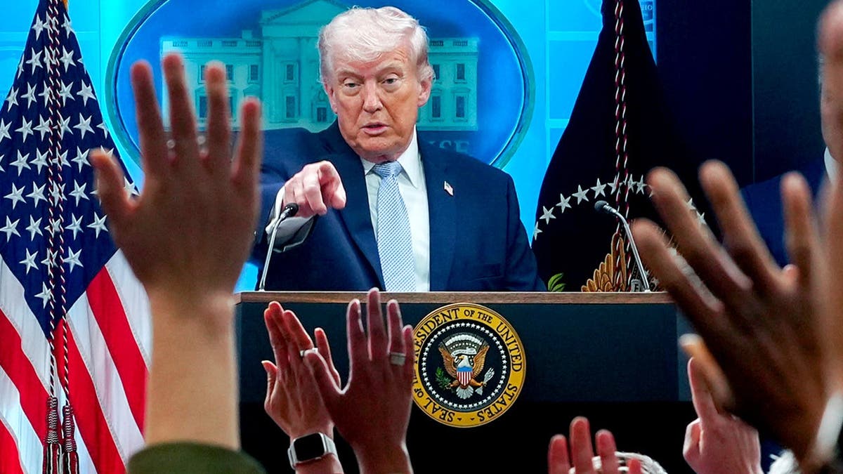 Trump speaks in White House briefing room during press conference.