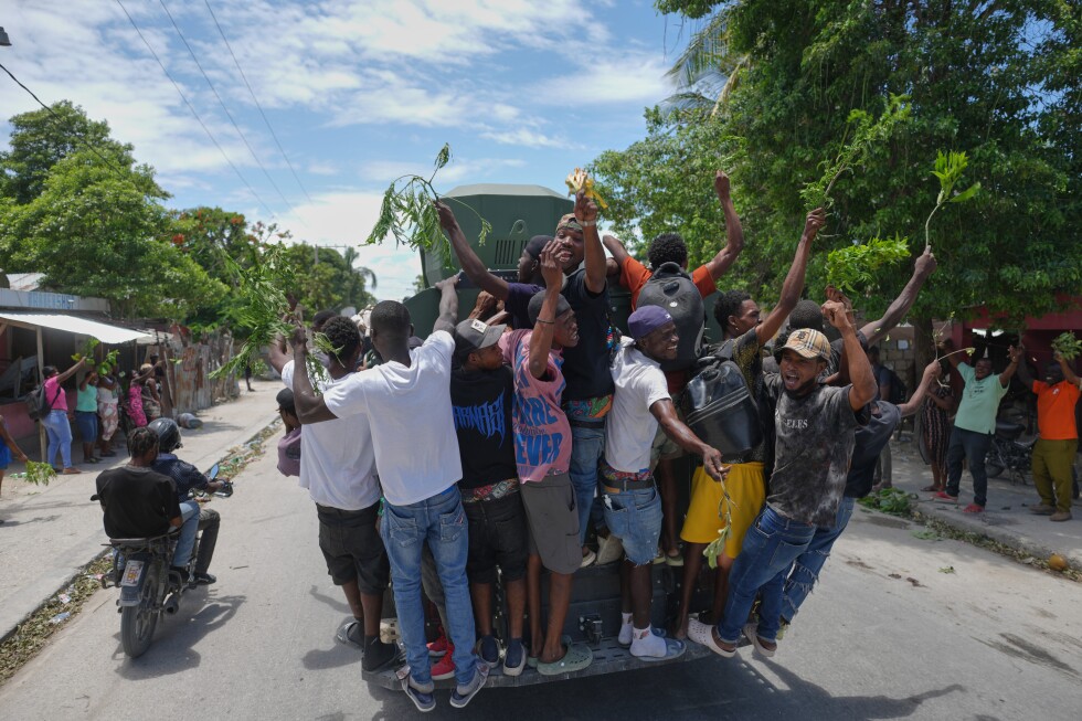 Residents in Haitian capital demand protection after gang violence displaces hundreds