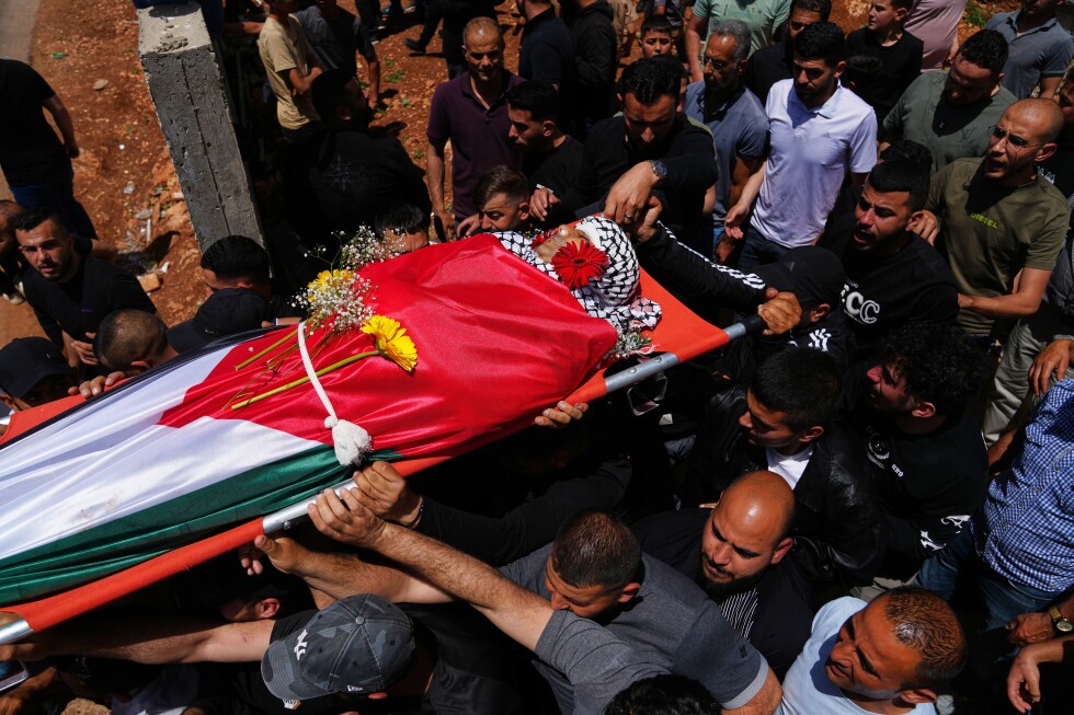 Palestinian man killed while climbing West Bank barrier into Israel
