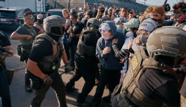 Photos show protestors and ICE agents clashing outside a New Jersey detention center - AP News