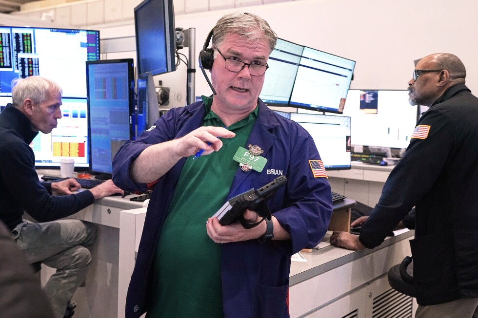 Wall Street’s record run stumbles as oil jumps and AI chip stocks slide