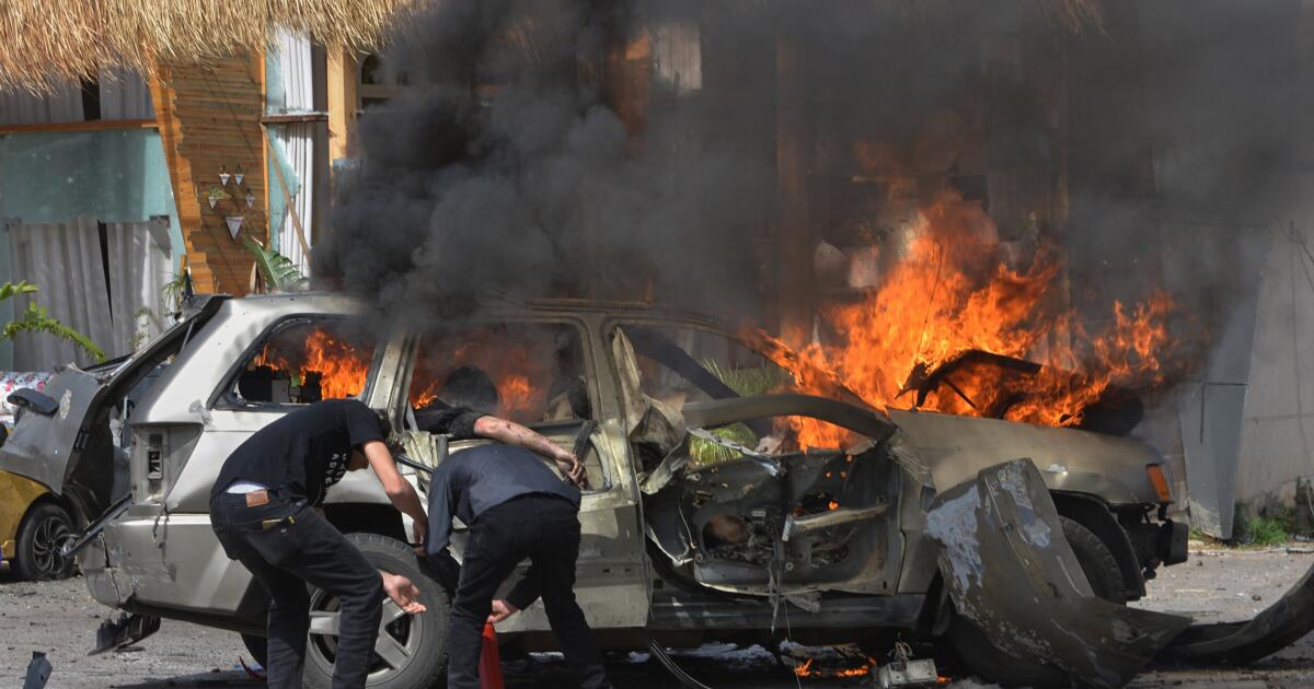 Israeli drone strikes on vehicles in Lebanon kill 12 people, including 2 children