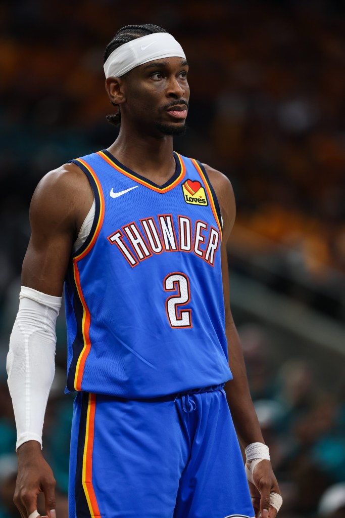 Shai Gilgeous-Alexander looking on during Game Three of the Thunder vs. Spurs series.