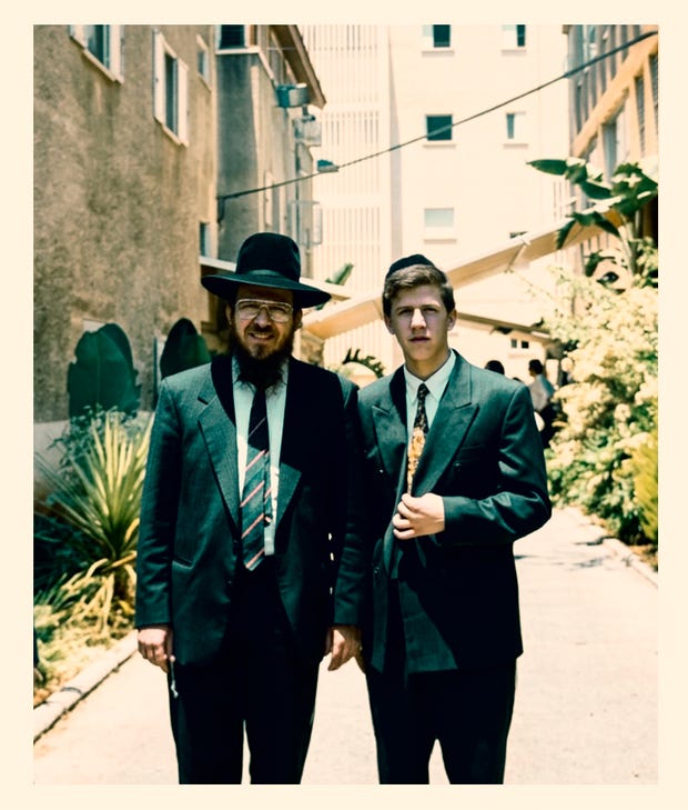 Nati Tucker (right), age 15, with one of the rabbis at Or Israel Yeshiva, where he studied. "The state is completely absent. There is no supervision, and the admissions process is like the Wild West.". Credit: Family album כתבה נתי טוקר