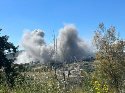 Smoke rises after a strike on the village of al-Sultaniyah in Nabatieh district, south Lebanon, Monday.