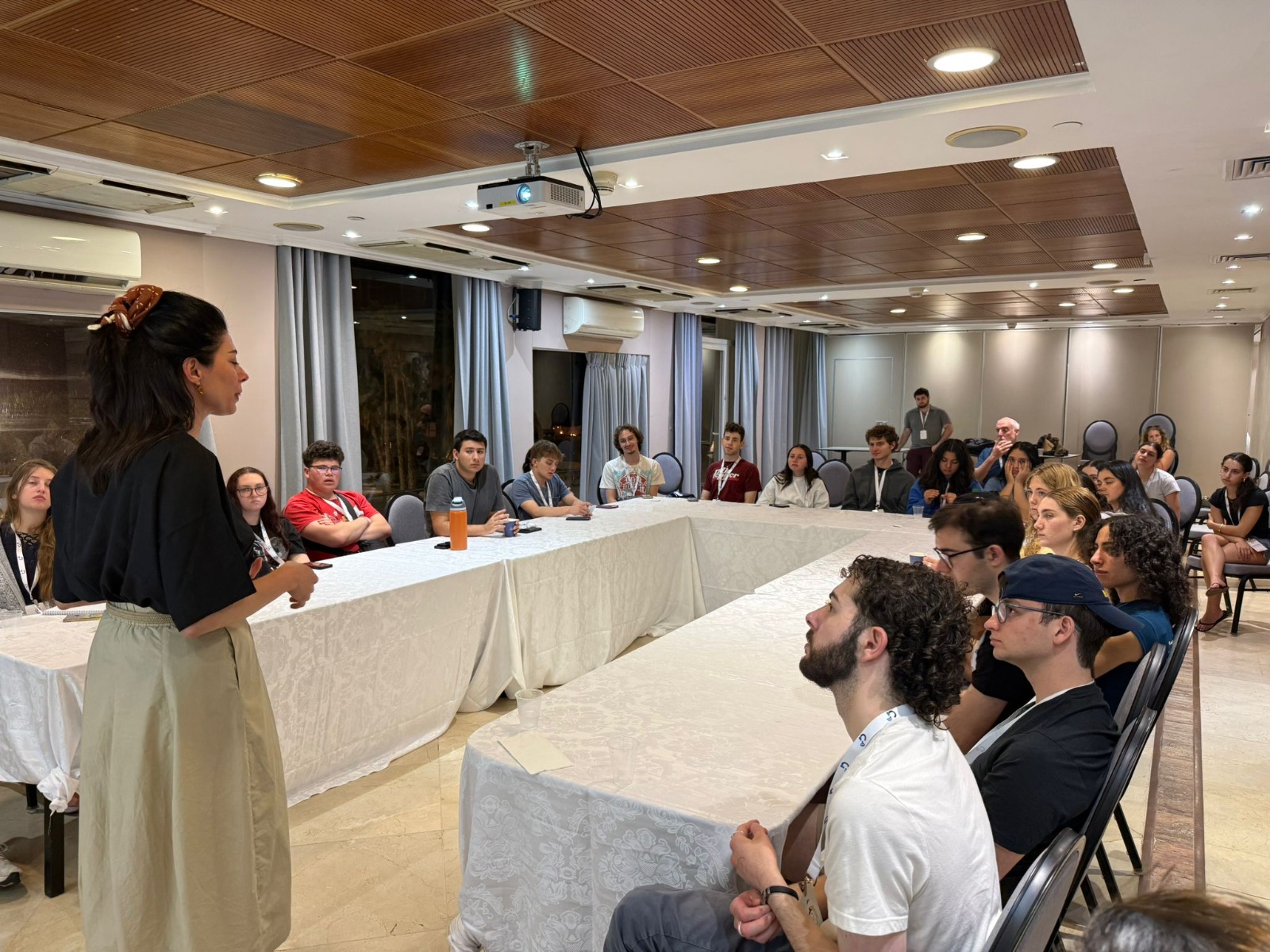Social influence Rawan Aswan addresses the delegation of American student leaders, May 26, 2026. Credit: Hasbara Fellowships and IsraelAmbassadors.com.