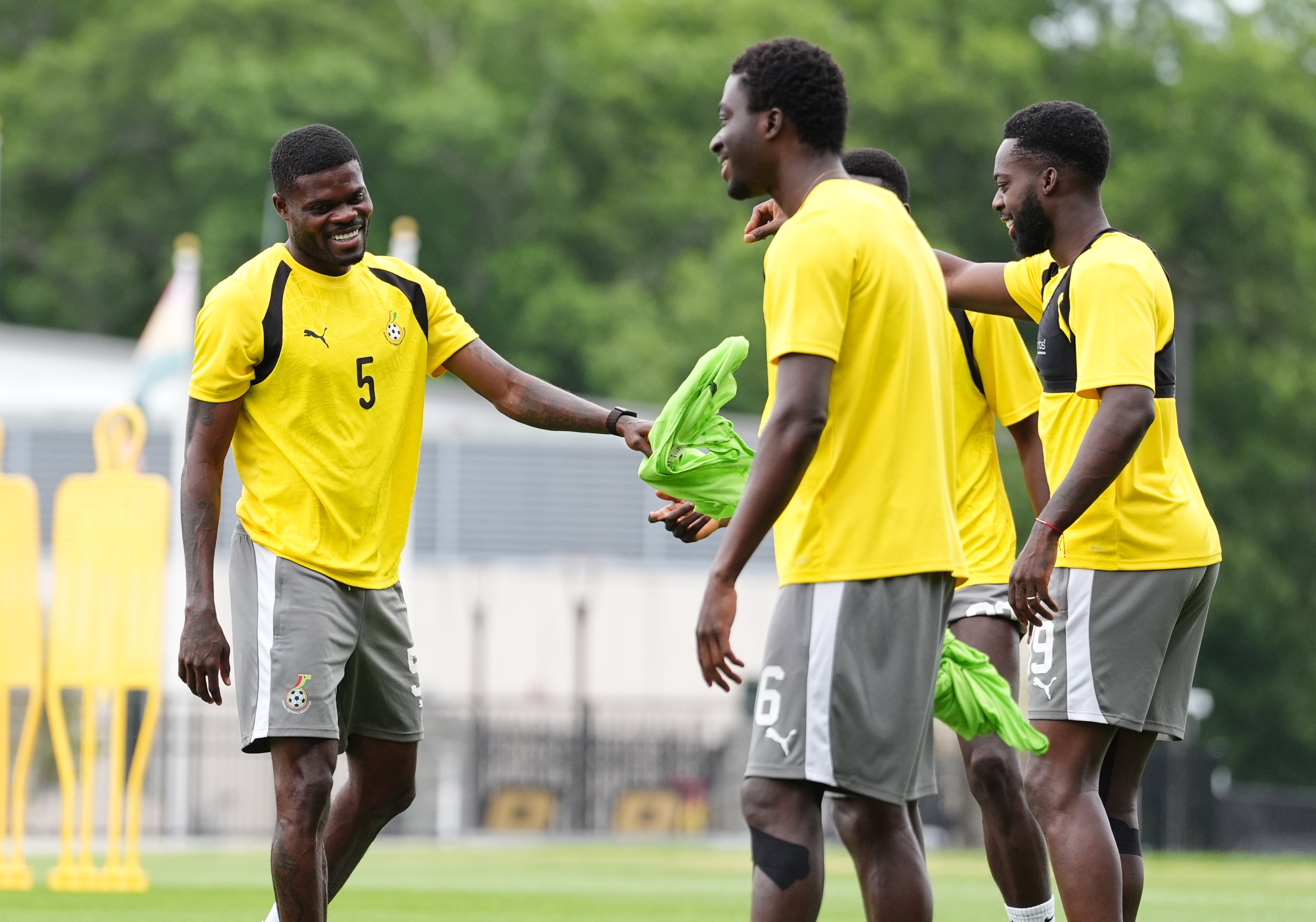 Partey, left, in training with his Ghana teammates at Bryant University, Smithfield