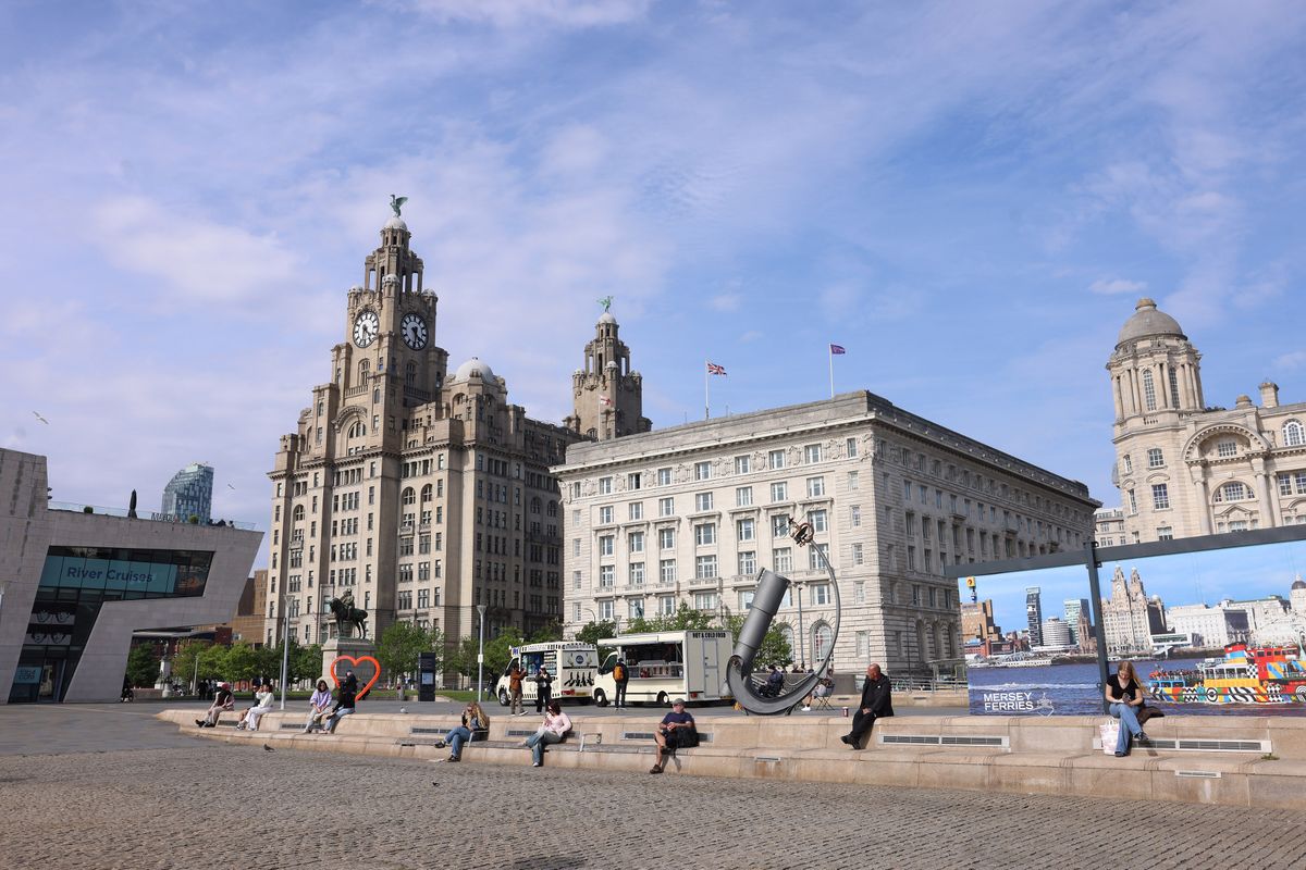 People enjoying the hot weather on Liverpool Pier Head