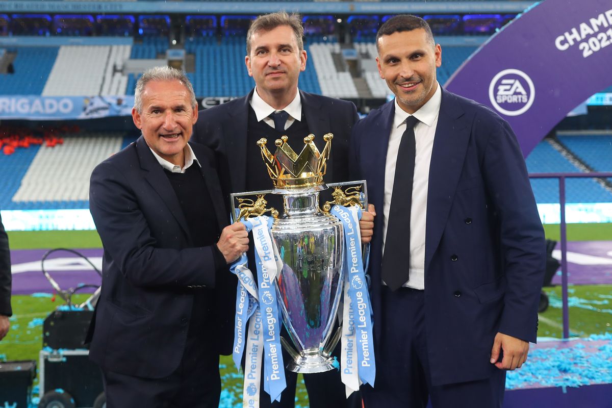 Txiki Begiristain (left) and Khaldoon Al Mubarak (right) celebrate Manchester City winning the Premier League with Ferran Soriano