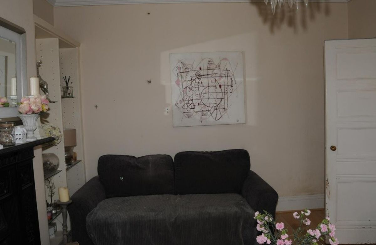 Bullet holes in Emma Rauf's parents house