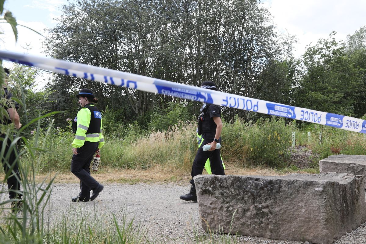 Cordons were put in place as divers searched water at Clifton Country Park