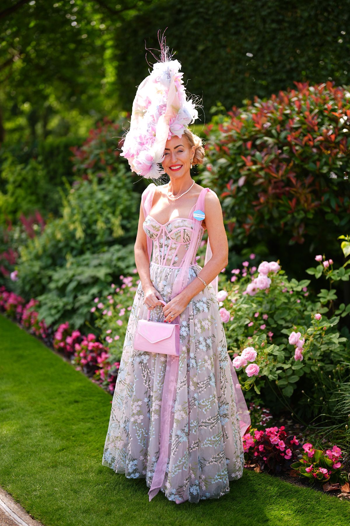 Racegoers arrive in their finery for the annual event