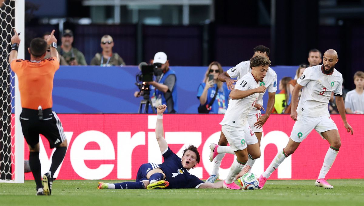 Scott McTominay #4 of Scotland appeals to Referee Ilgiz Tantashev after challenged by Neil El Aynaoui #24 of Morocco during the FIFA World Cup 2026 Group C match between Scotland and Morocco at Boston Stadium on June 19, 2026 in Foxborough, Massachusetts