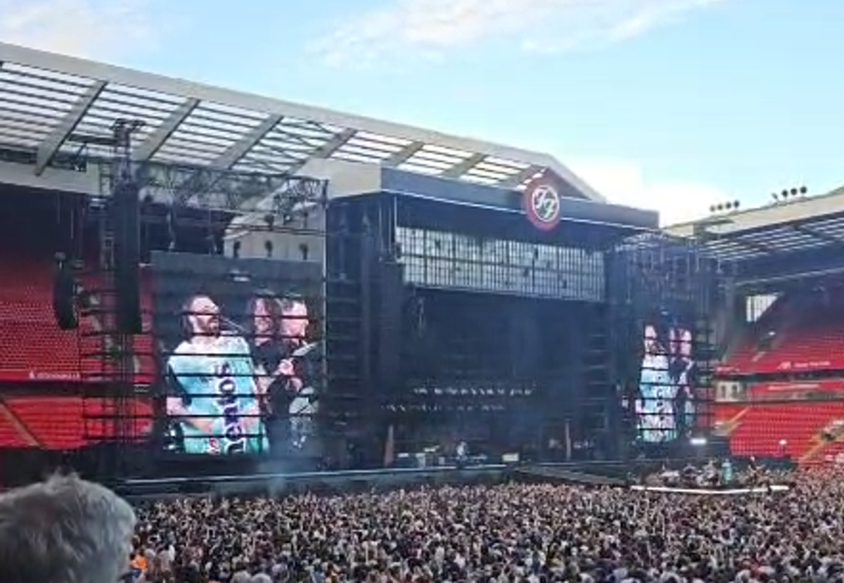 The band brought a costumed fan on stage