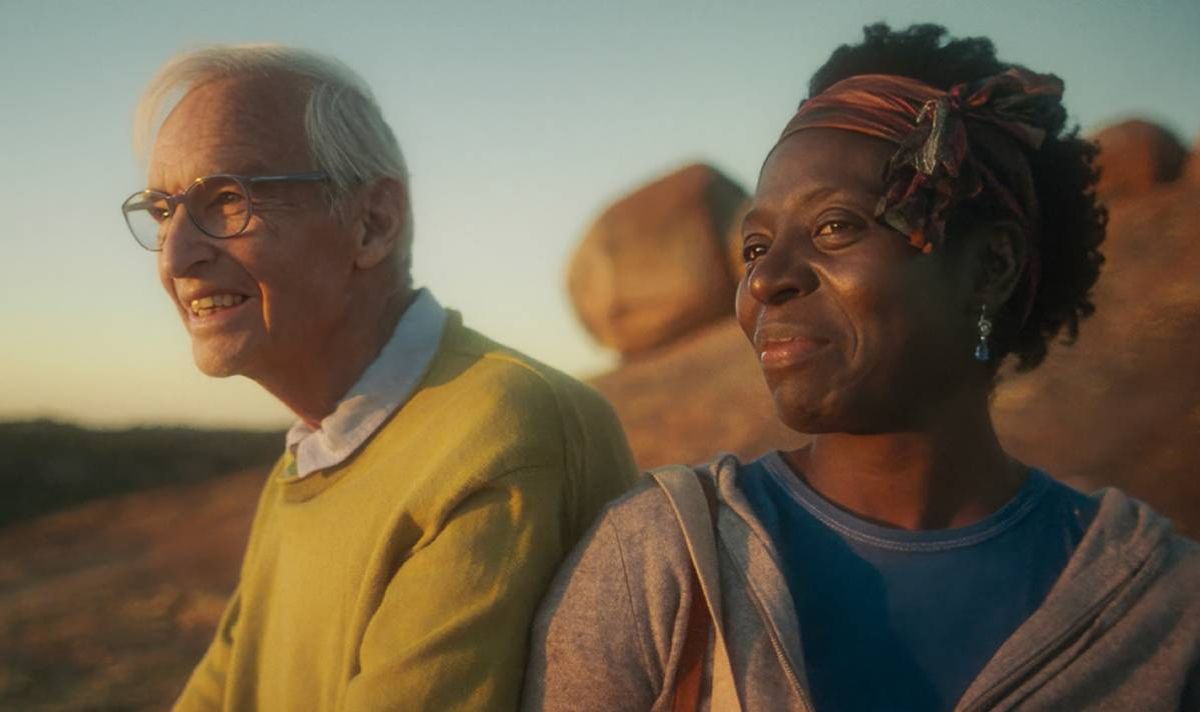 man and woman looking into the distance