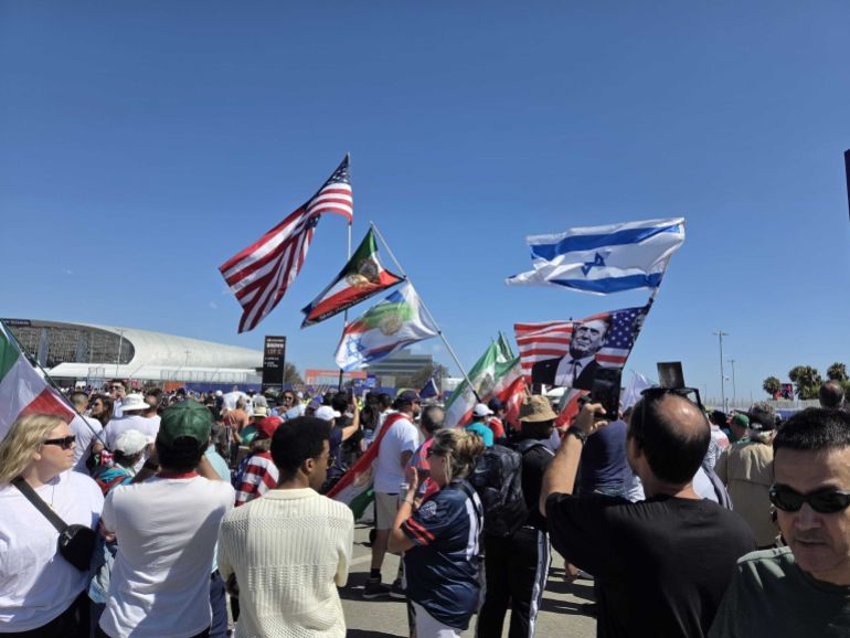 Protesters outside the Los Angeles Stadium [Ali Harb/Al Jazeera]