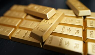 Gold climbs over 1% as oil drops on US-Iran interim deal