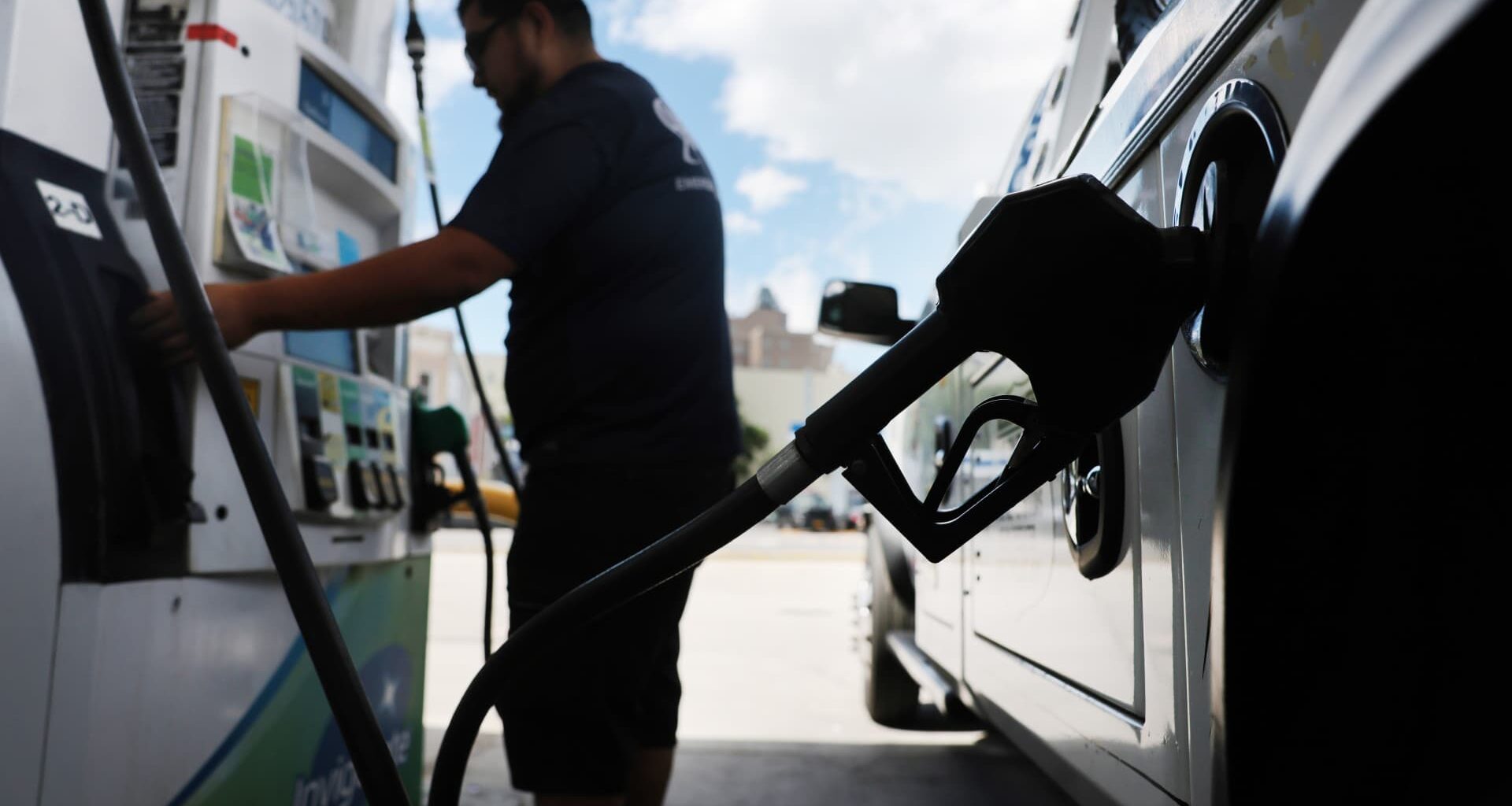 Gas prices fall below $4 per gallon as oil supply fears ease after Iran deal