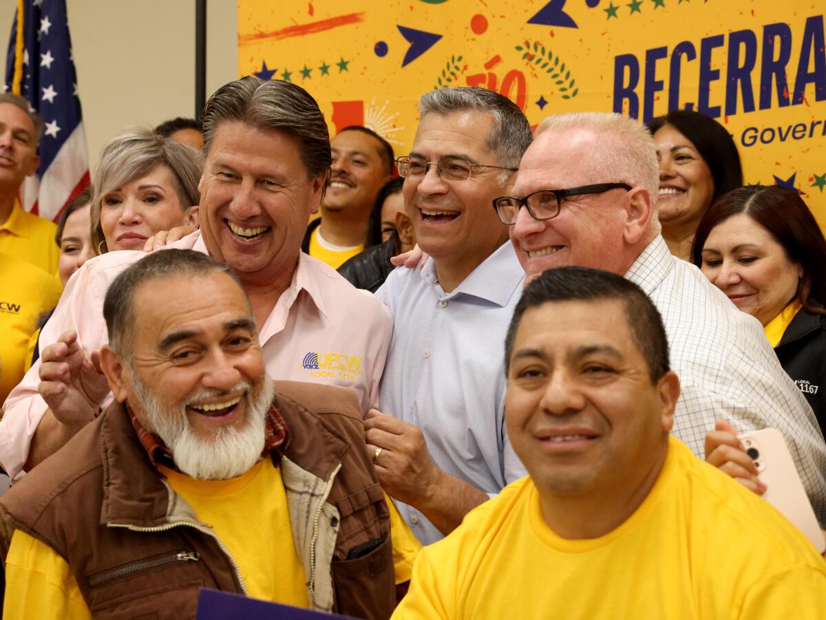 Xavier Becerra shares a light moment with supporters at the UFCW Local 1167 Union Hall