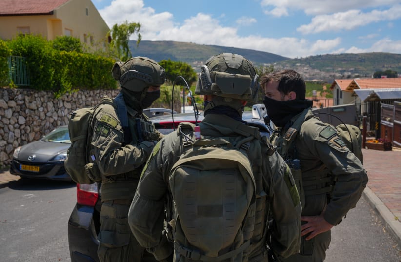Israeli security forces at the scene where a house was hit by an explosive drone launched by Hezbollah from Lebanon in Metula near the Israeli-Lebanese border, May 25, 2026. 
