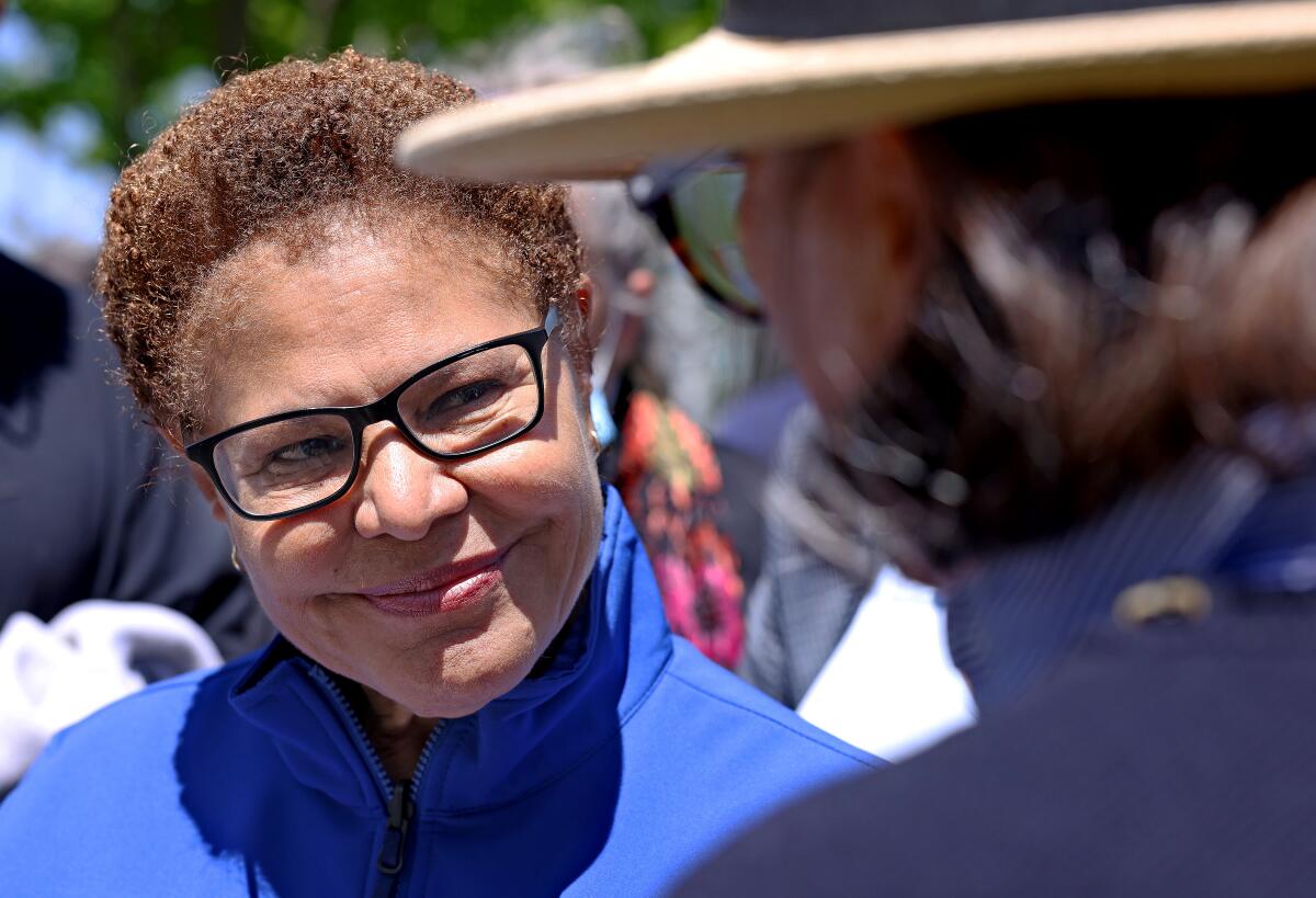 Mayor Karen Bass mingles at a day of community healing in 2025.