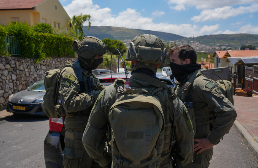 Israeli security forces at the scene where a house was hit by an explosive drone launched by Hezbollah from Lebanon in Metula near the Israeli-Lebanese border, May 25, 2026.