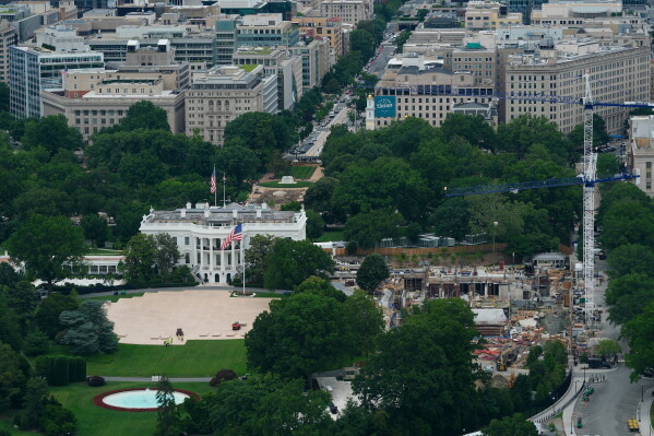 Work continues on the construction of the ballroom at the White House, May 21, 2026, in Washington, where the East Wing once stood, as work also begins for the upcoming UFC fight on the South Lawn. (AP Photo/Pablo Martinez Monsivais, File)