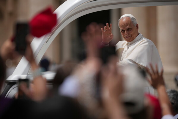 Pope Leo XIV waves as he leaves after his weekly general audience in St. Peter's Square at The Vatican, Wednesday, June 3, 2026. (AP Photo/Andrew Medichini)