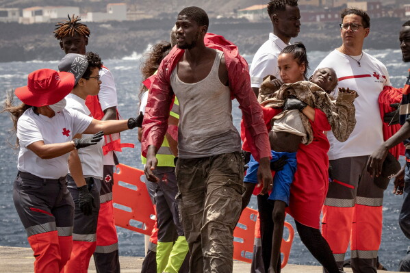 Migrants disembark at the port of "La Estaca" in Valverde on the Canary island of El Hierro, Spain, Aug. 26, 2024. Emergency services said the migrants arrived by boat after a 13-day voyage from Senegal. (AP Photo/Maria Ximena, File)