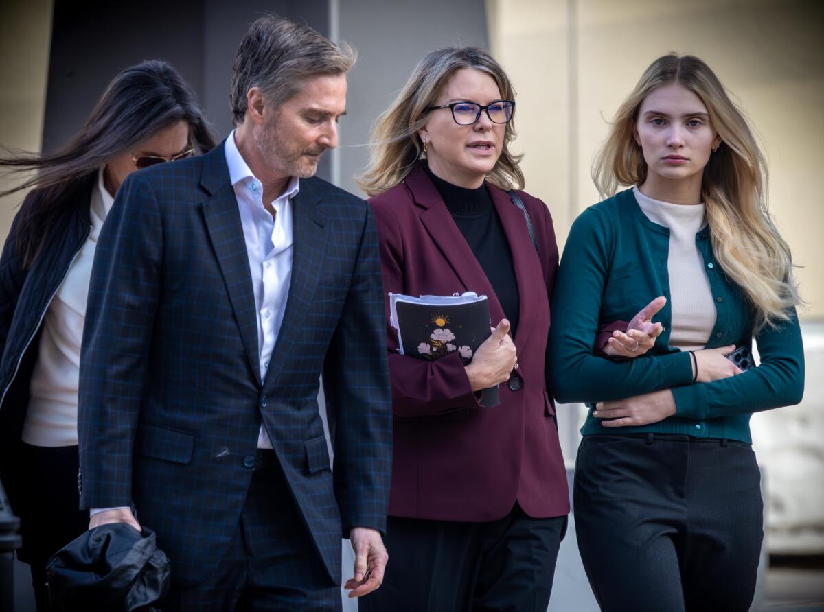 Rebecca Grossman, Dr. Peter Grossman and their daughter.