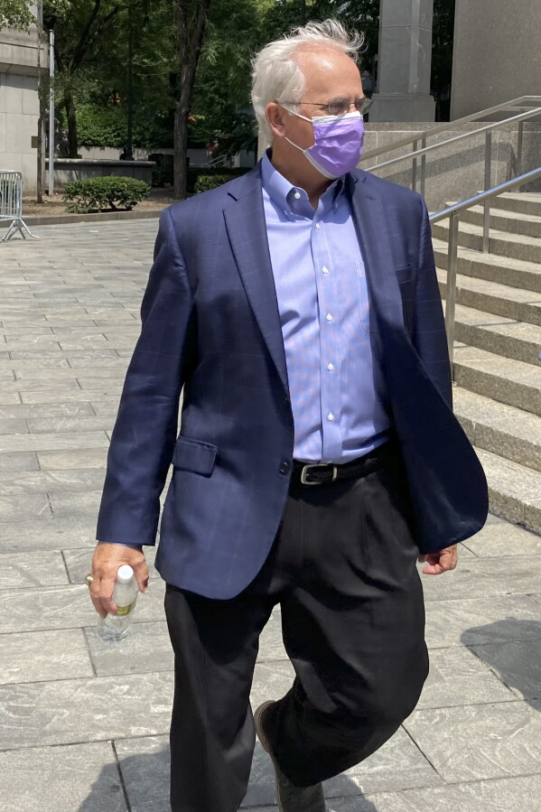 Former U.S. Rep. Stephen Buyer leaves Manhattan federal court after pleading not guilty to charges that he participated in an insider trading scheme while working as a consultant, July 27, 2022, in New York. (AP Photo/Larry Neumeister, File)