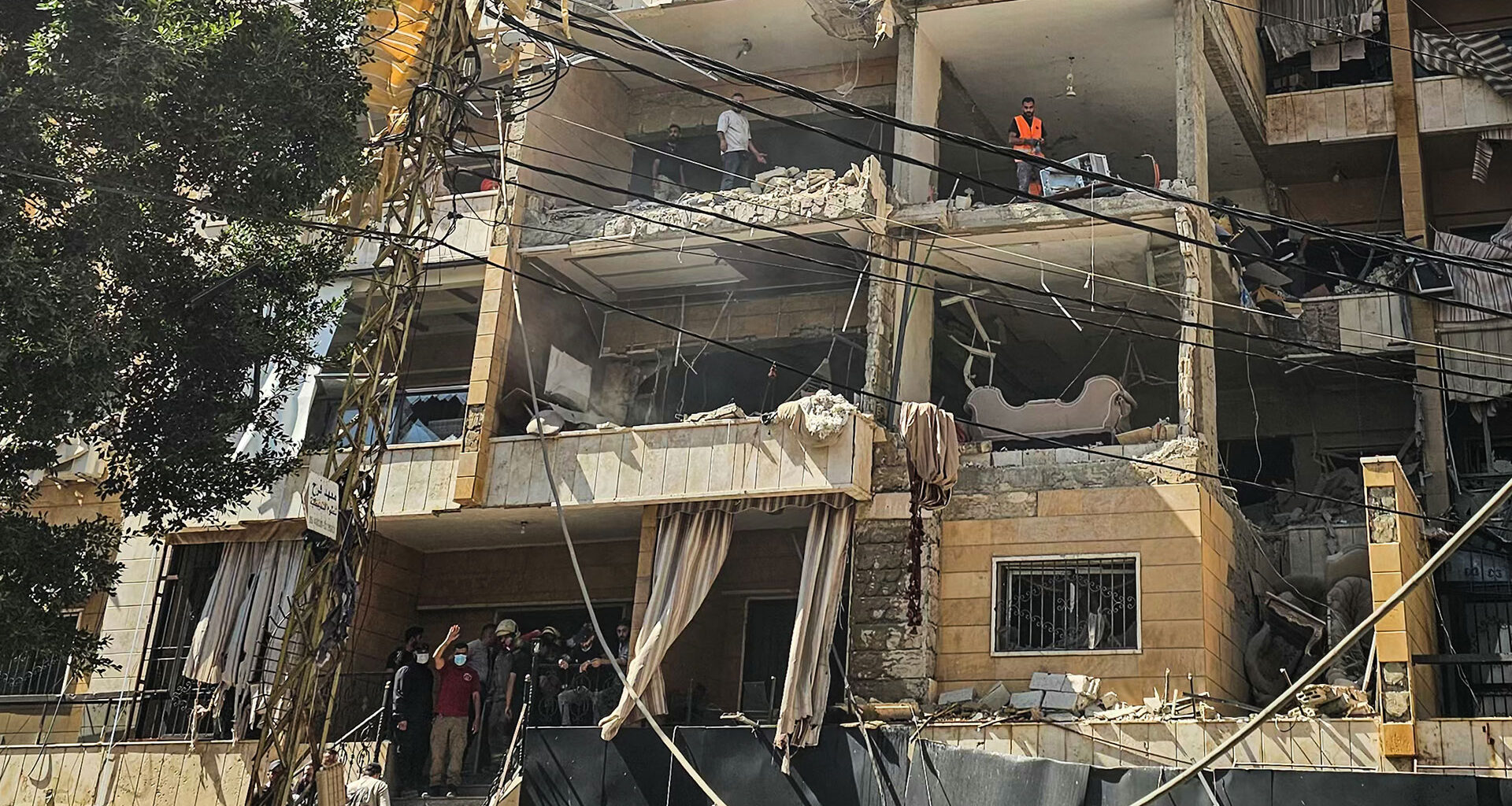 Israel Strikes Beirut Suburbs Despite Ceasefire, Raising Fears of Wider War