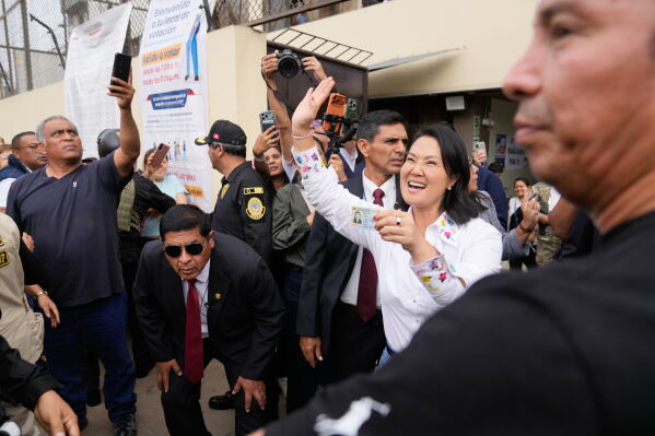 Presidential candidate Keiko Fujimori of the Popular Force party waves after voting during the presidential runoff election in Lima, Peru, Sunday, June 7, 2026. (AP Photo/Martin Mejia)
