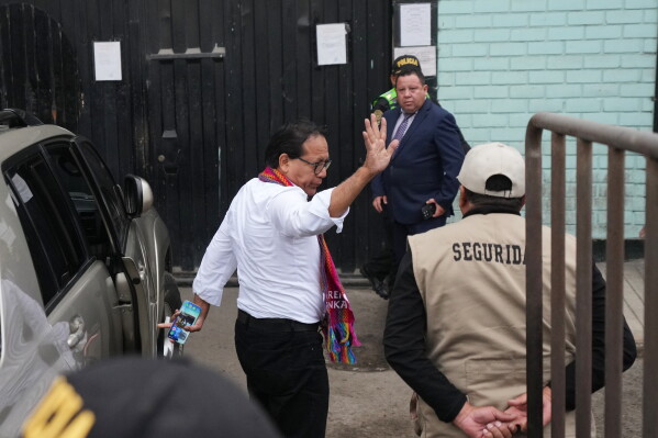 Presidential candidate Roberto Sanchez of the Together for Peru party arrives at Barbadillo Prison to visit former President Pedro Castillo after voting during the presidential runoff election in Lima, Peru, Sunday, June 7, 2026. (AP Photo/Rodrigo Abd)