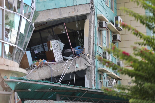 A building is damaged after an earthquake in General Santos, Philippines, Monday, June 8, 2026. (AP Photo)