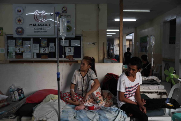 Evacuated residents take shelter at a hospital following an earthquake in General Santos, Philippines Tuesday, June 9, 2026. (AP Photo/Basilio Sepe)