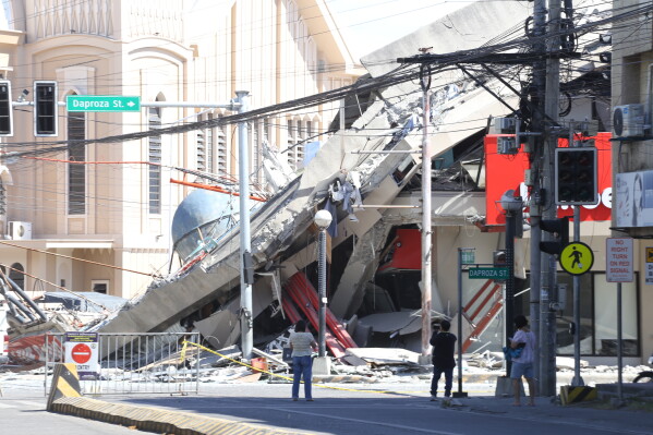 A building is damaged after an earthquake in General Santos, Philippines, Monday, June 8, 2026. (AP Photo)