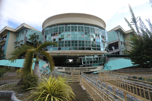 A building is damaged after an earthquake in General Santos, Philippines, Monday, June 8, 2026. (AP Photo)