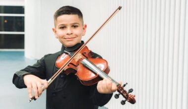 Youssef Sarhan, a 9-year-old violinist from Majd al-Krum, participates in The Jerusalem Orchestra East & West’s youth initiative.