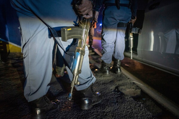 Police patrol an area in Soweto, South Africa, July 12, 2022 in search of illegal firearms following a deadly bar shooting. (AP Photo, File)