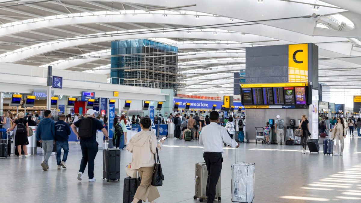 Passengers at the departures hall of Terminal 5 at London Heathrow Airport in London, UK, on Monday, July 14, 2025. London??Heathrow??Airport??plans to invest ??10 billion ($13.6 billion) over the next five years to upgrade its terminals and services after the dominant UK hub slipped in global airport rankings. Photographer: Jason Alden/Bloomberg via Getty Images
