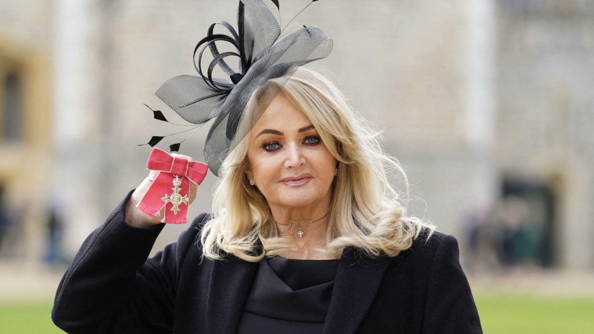 (FILES) British singer Gaynor Sullivan aka Bonnie Tyler poses with her medal after being appointed a Member of the Order of the British Empire (MBE) during an investiture ceremony at Windsor Castle on February 1, 2023. Husky-voiced Welsh singer Bonnie Tyler was 