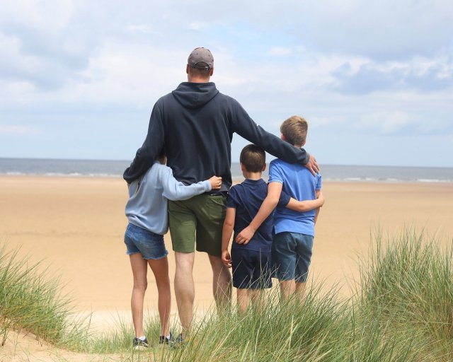 Prince George, Princess Charlotte and Prince Louis have posted a Father's Day tribute to their father, Prince William, in their first social media post. The post, external reads: "We love you, Papa. Happy Father's Day", followed by two red hearts. In the picture, taken by Catherine, the Princess of Wales, William can be seen standing on a beach with his arms round his children, looking out to sea. Kensington Palace said it was taken on a trip to the Norfolk coast last month. https://www.instagram.com/p/C8Rb1TRtNnh https://www.instagram.com/princeandprincessofwales princeandprincessofwales We love you, Papa. Happy Father?s Day G, C & L The Princess of Wales, 2024