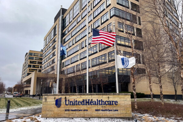 The UnitedHealthcare headquarters in Minnetonka, Minn., lowered its flags to half-staff on Dec. 4, 2024, in honor of CEO Brian Thompson, who was fatally shot outside a hotel in New York. (Kerem Yücel/Minnesota Public Radio via AP, File)