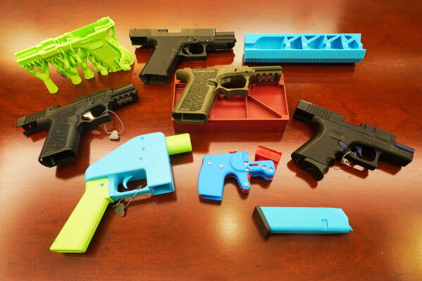 Ghost guns, provided by the New York City Police Department, are displayed in the Manhattan District Attorney's office on Oct. 15, 2025. (AP Photo/Richard Drew)